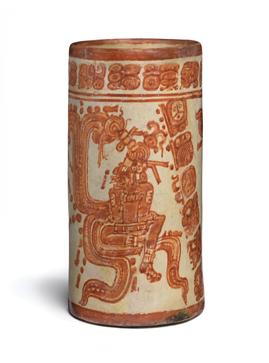 Cylinder Vessel with Solar Deities, 650-850, Maya, slip-painted ceramic, d: 3 in. (7.6 cm), 7 x 3 x 3in. (17.8 x 7.6 x 7.6 cm), Los Angeles County Museum of Art, purchased with funds provided by Camilla ChandlerFrost (M.2010.115.755) photo © Museum Associates / LACMA