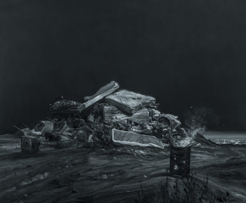 The artwork titled 'The City' by Vincent Valdez depicts a dark and desolate scene with a central pile of debris, including discarded mattresses, tires, and other items. In the foreground, a metal barrel emits smoke, adding to the somber atmosphere. The background is dark and indistinct, emphasizing the central pile and creating a sense of abandonment and neglect.