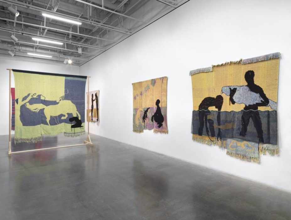 Exhibition view of 'The Art of the African Diaspora' at MoMA, New York, featuring a vibrant collection of contemporary art.